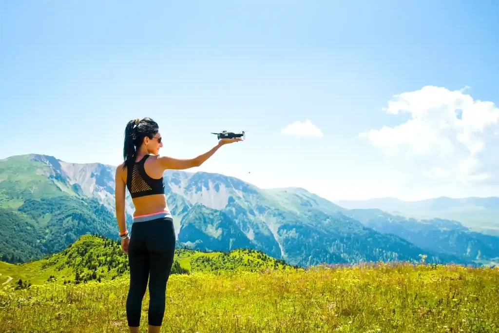 A photographer reviving film techniques with a camera, central to Photography Trends July 2025.
