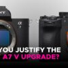 Two Sony Alpha camera bodies side-by-side, showing the front mounts of the A7 IV and the new A7 V, with text asking: “Can you justify the Sony A7 V upgrade?”