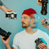 hotographer overwhelmed by photography burnout in the creator economy, surrounded by multiple cameras and hands pulling in different directions